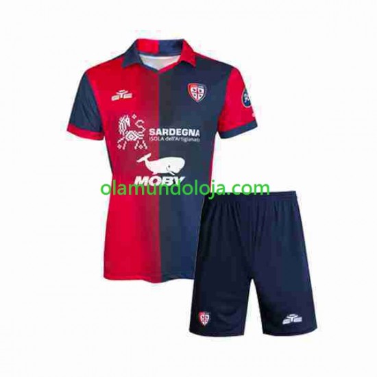 Camisola Cagliari Criança Equipamento Primeiro 2023-2024 Manga Curta